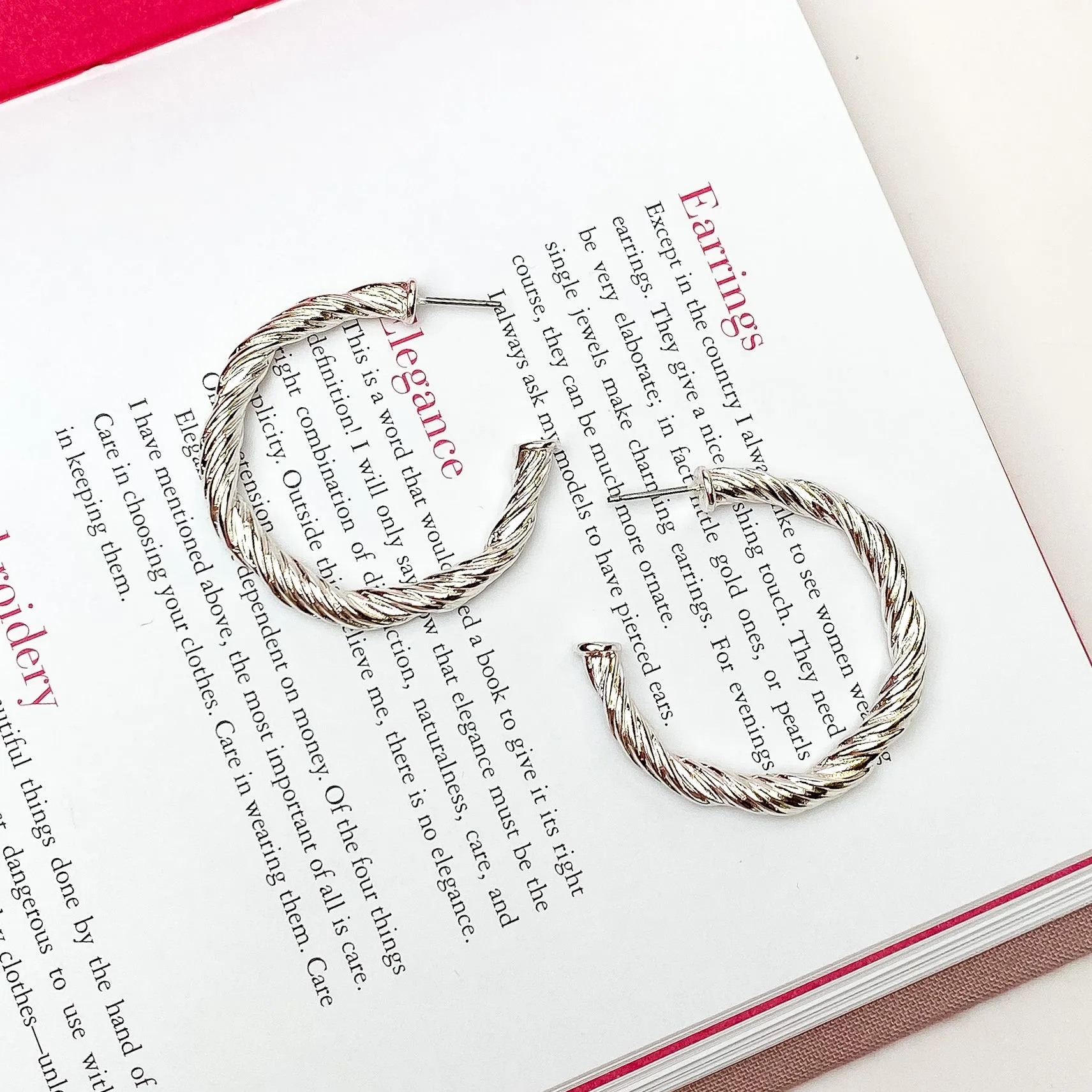 Anything Goes Twisted Medium Hoop Earrings in Silver Tone