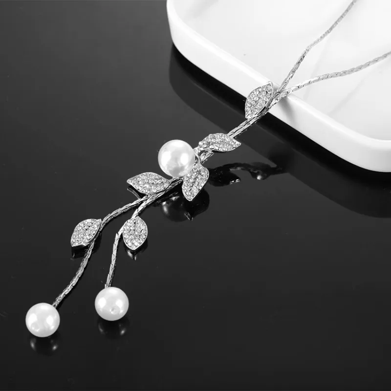 Elevate Your Style with our Y-Shaped Charm Necklace featuring Leaf Shaped Rhinestones & Faux Pearls Pendant, Dangle Long Necklace, and Adjustable Elegant Tassel Sweater Chain - Perfect for Women and Girls