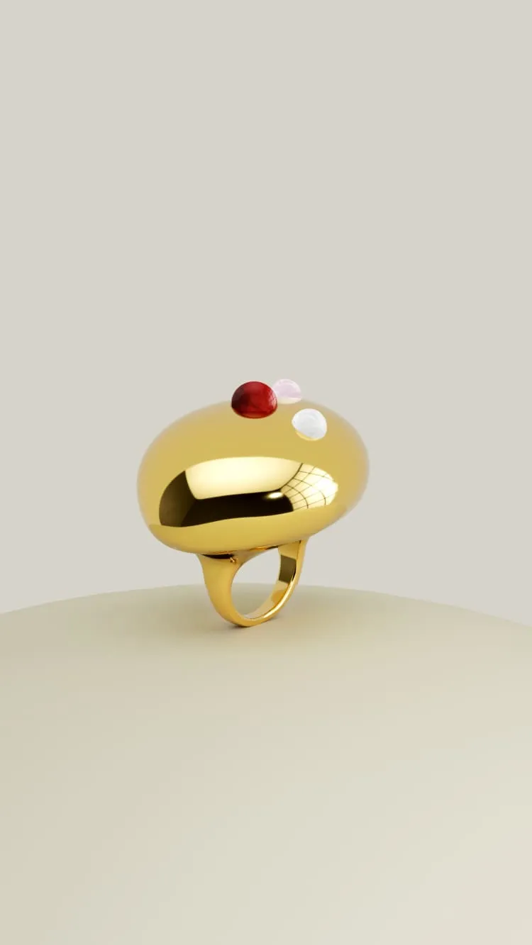 gold cocktail ring with stones