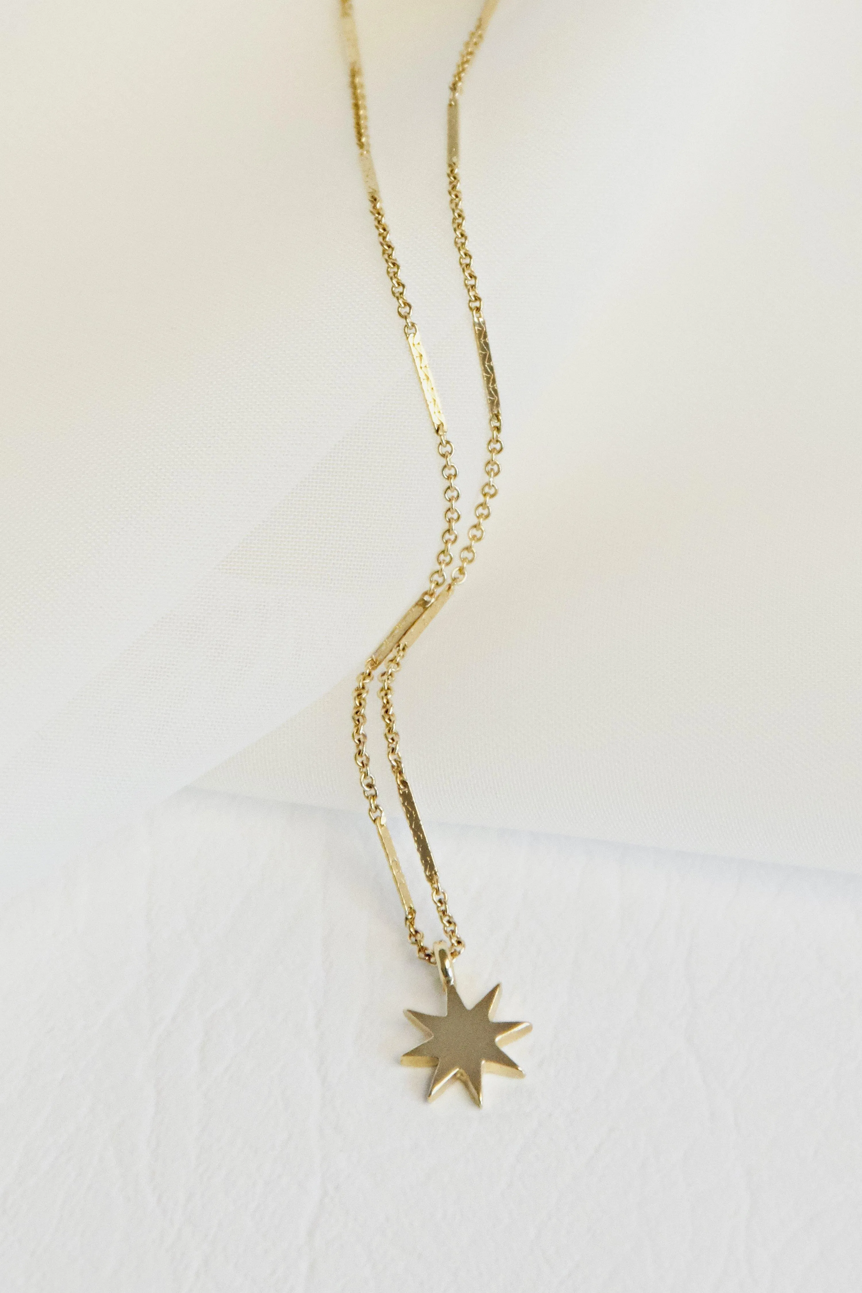 gold star necklace