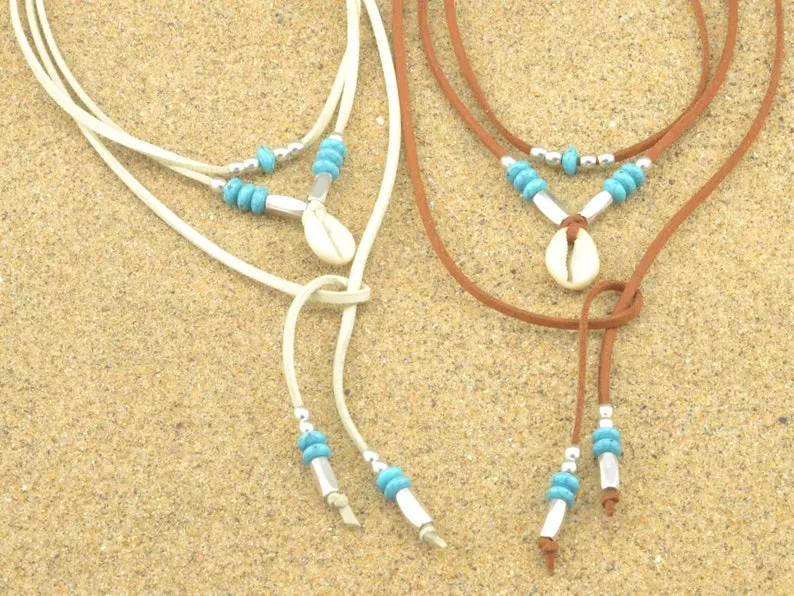 Leather Lariat Layered Necklaces Choose Cowrie Shell And Beads Clear And Amber Crystals Clear And Smokey Crystals Or Natural Turquoise Stones Wear Them Long Or As Stacked Tiered Necklaces Choose Tan Black Or White Cowhide