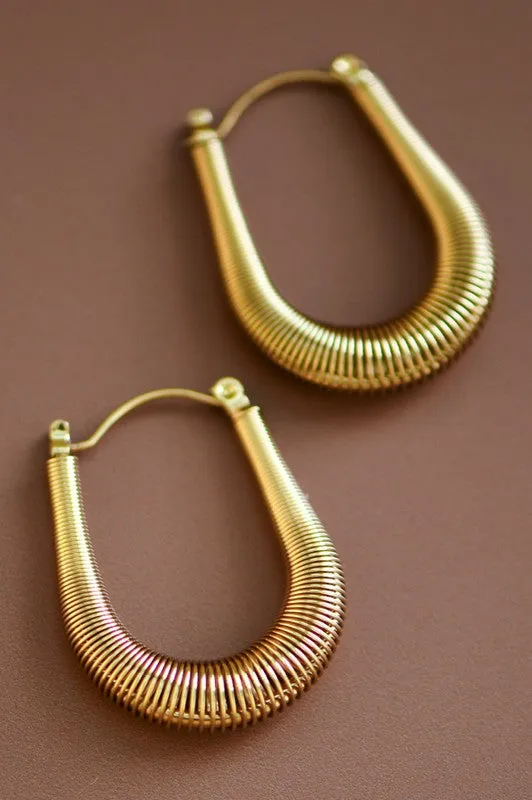 The Billie Coil Spring Hoop Earrings